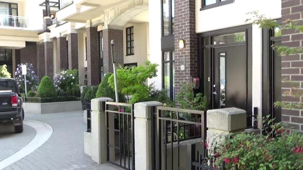 Stylish Townhouses with Mini Gardens and Water Feature